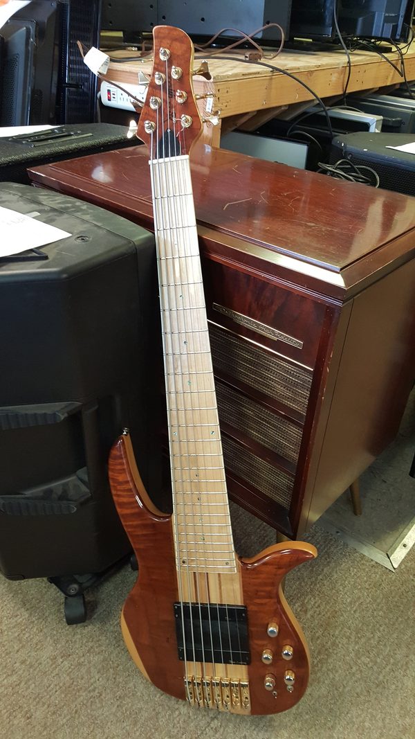 Six-string bass guitar in for repair