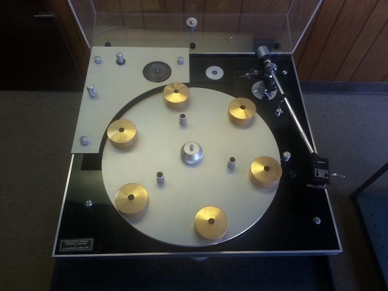 Michell Transcriptor turntable with clear platter and tonearm