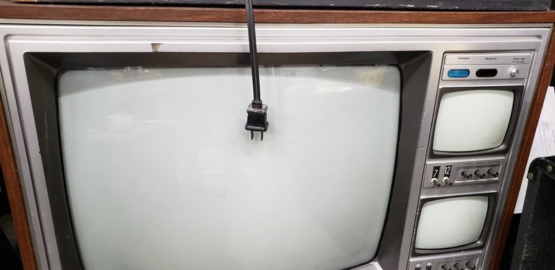 Vintage console CRT TV with built-in monitor screens